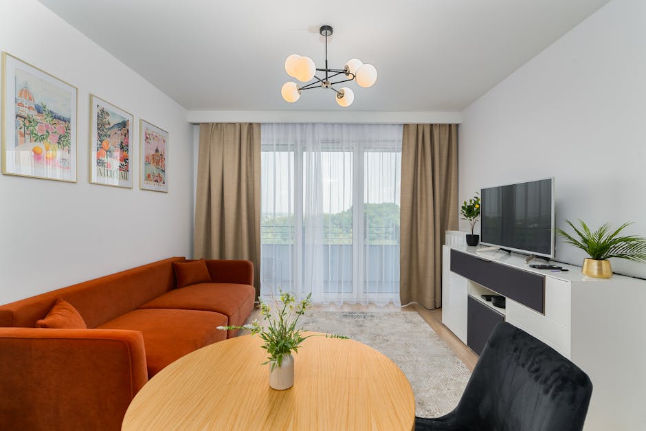 A cozy modern living room with elegant decor and natural light streaming in.